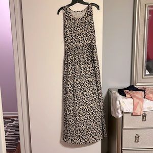 Long flowing leopard floor length dress. Wrinkle free and ready to wear!